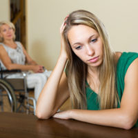 Image of a woman in a wheel chair Image of a woman in a wheel chair