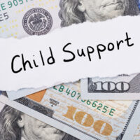 Child support Sign On Dollar Bills