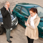 Man and woman in a car accident Man and woman in a car accident