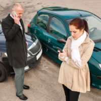 Man and woman in a car accident