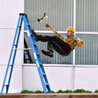 Man falls off a ladder Man falls off a ladder