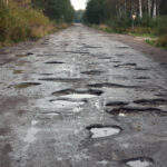 many potholes on road show poor conditions many potholes on road show poor conditions