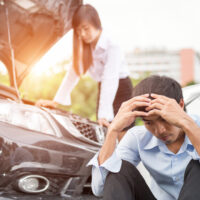 man-upset-due-to-car-accident