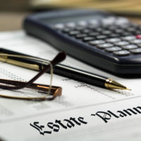 Glasses and estate plan document Glasses and estate plan document
