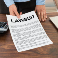 Form that reads Lawsuit Form that reads Lawsuit