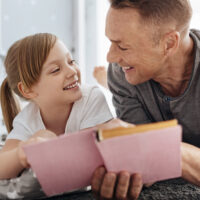 A young lady and her dad).jpg.crdownload A young lady and her dad).jpg.crdownload