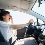 Drowsy lady behind the wheel Drowsy lady behind the wheel