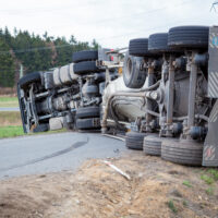 a flipped over Truck