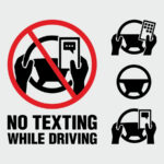 No texting while driving sign No texting while driving sign