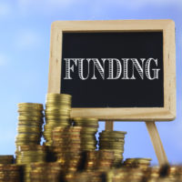 sign that reads funding with coins.jpg.crdownload sign that reads funding with coins.jpg.crdownload