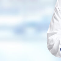 Hands of medical doctor holding clipboard