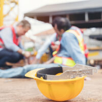 Construction builder worker accident at construction site. Industrial accident concept. Health safe of work and safety first concept